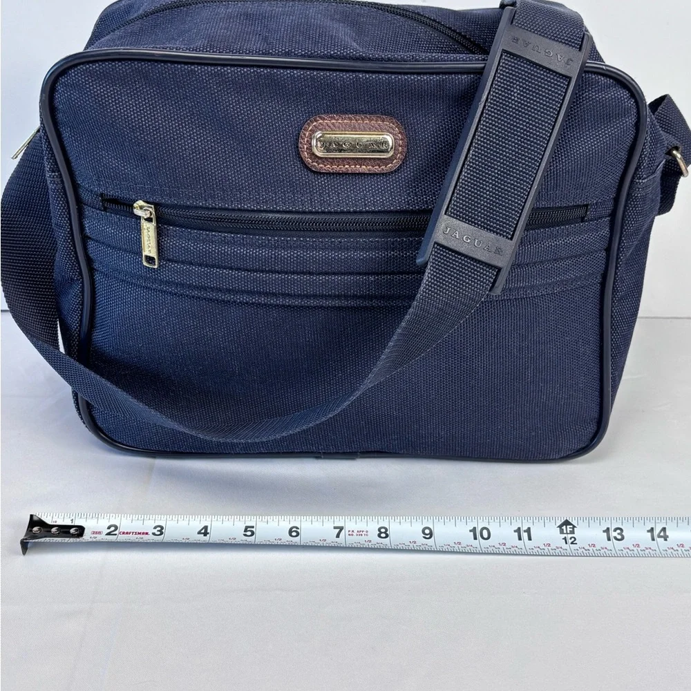 Jaguar Blue Travel Bag with Durable Fabric and Leather Accents. Nice Condition!